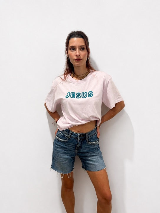Woman wearing oversized Lilac hand-beaded JESUS t-shirt, Christian and Orthodox tee, front view