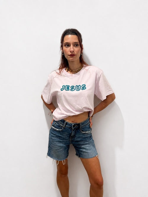 Woman wearing oversized Lilac hand-beaded JESUS t-shirt, Christian and Orthodox tee, front view