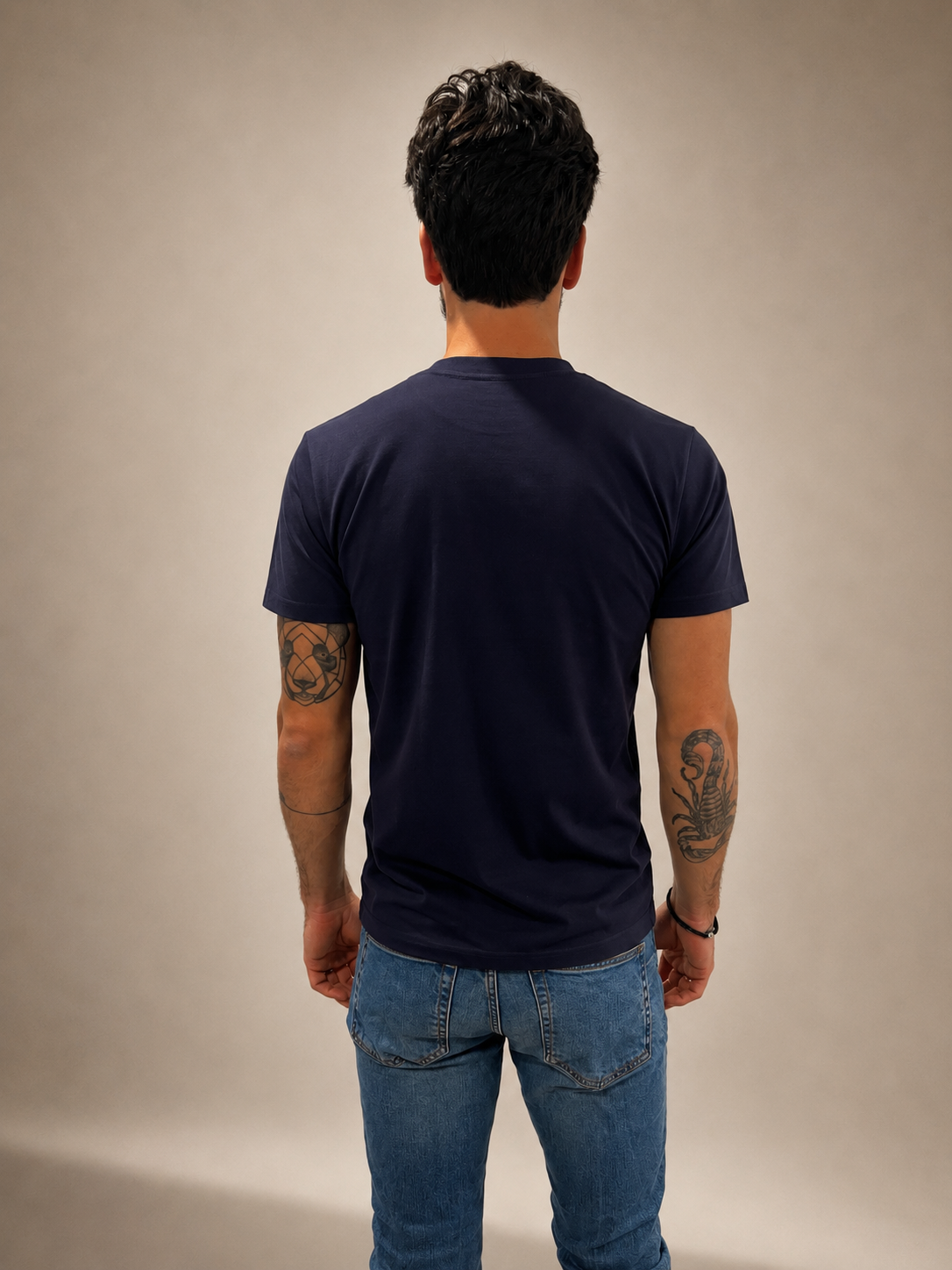 Back view of Navy Blue hand-beaded JESUS t-shirt